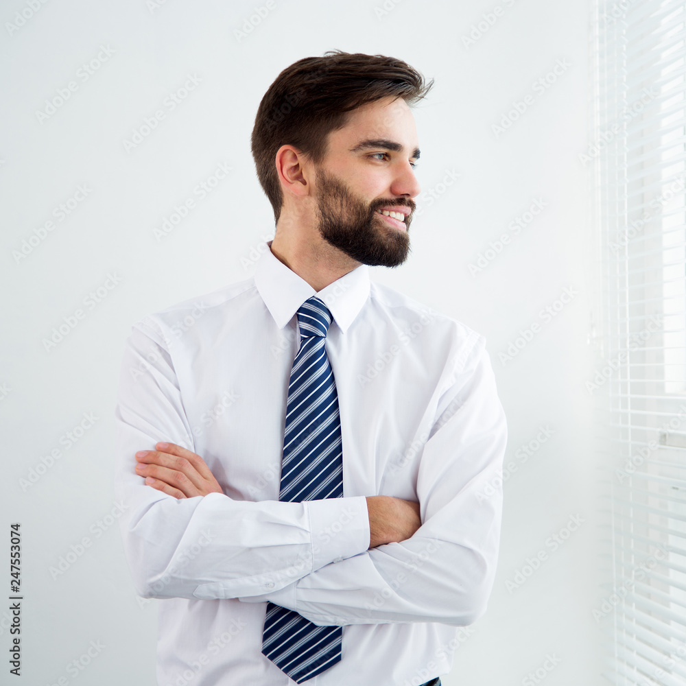 Young businessman in the office Young businessman in the office