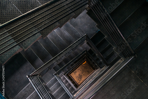 Square steel stairwell view from the top. photo