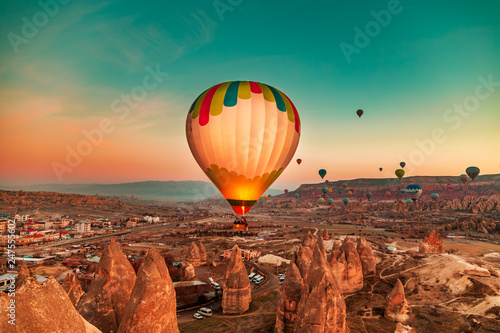 Magnificent dawn with hot air balloons.