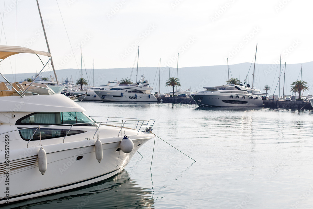 Marina with yachts on sunset.