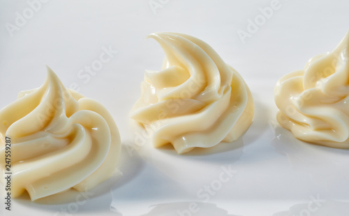 Assorted decorative twists of creamy mayonnaise