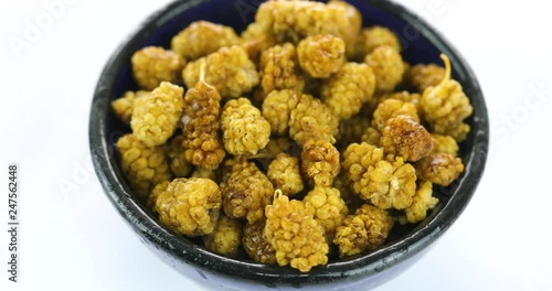 dry white mulberry on white background