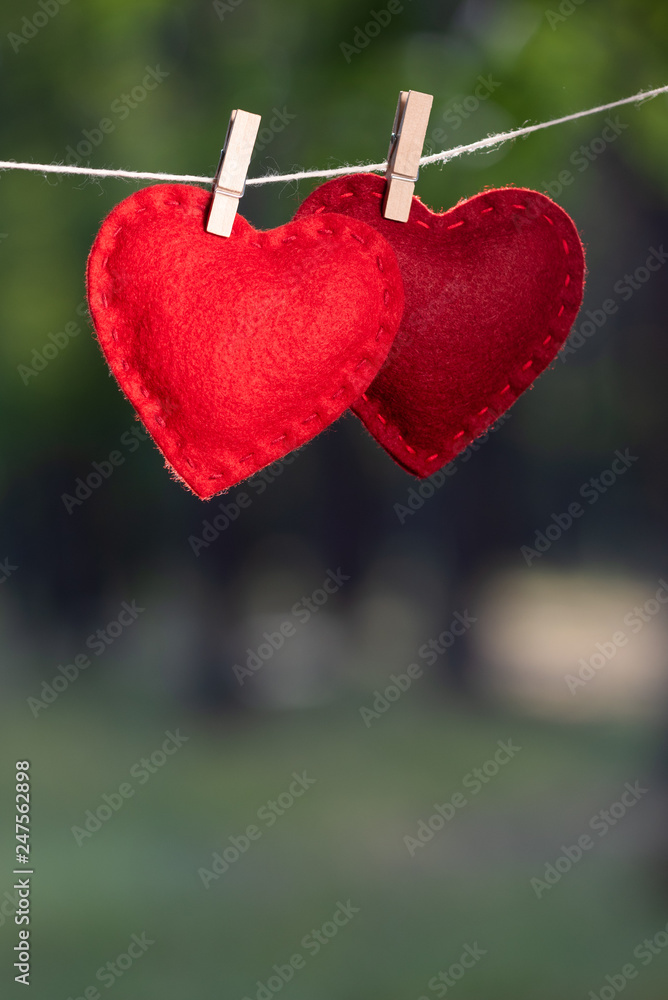 Valentine's day greeting card with a pair of red hearts Valentine's day greeting card with a pair of red hearts