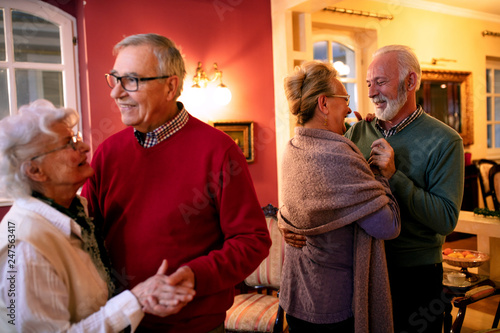 Older couple dancing in the room