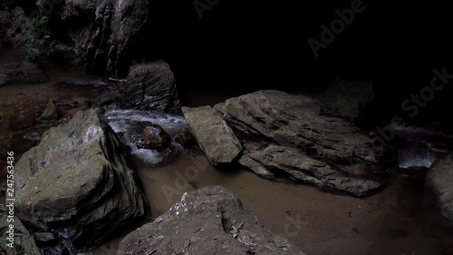 Waterfall inside of limestone cave.