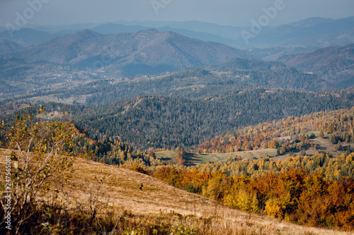 Beautiful mountain autumn landscape with colorful forest. Aerial view