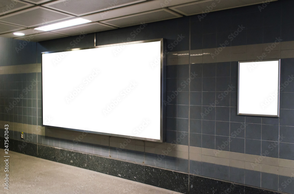 big blank advertising billboard on wall with copy space for your text message or media and content in subway train station or airport, information board, banner, marketing and advertising concept big blank advertising billboard on wall with copy space for your text message or media and content in subway train station or airport, information board, banner, marketing and advertising concept