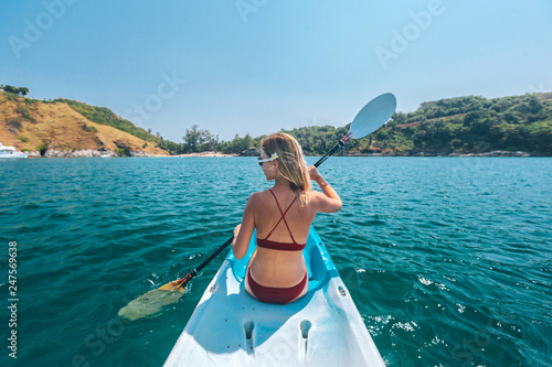 Woman kayaking in Thailand © Alena Ozerova