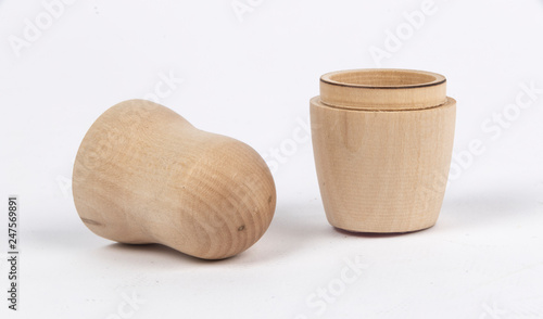 Open wooden nesting doll isolated