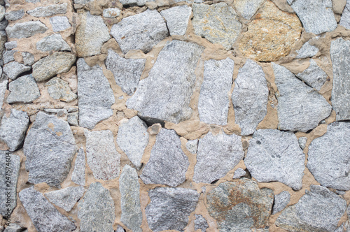 Stone rock pattern on wall, background.