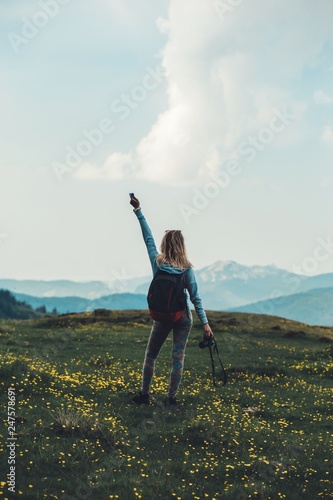 Girl  on top of a mountain ...