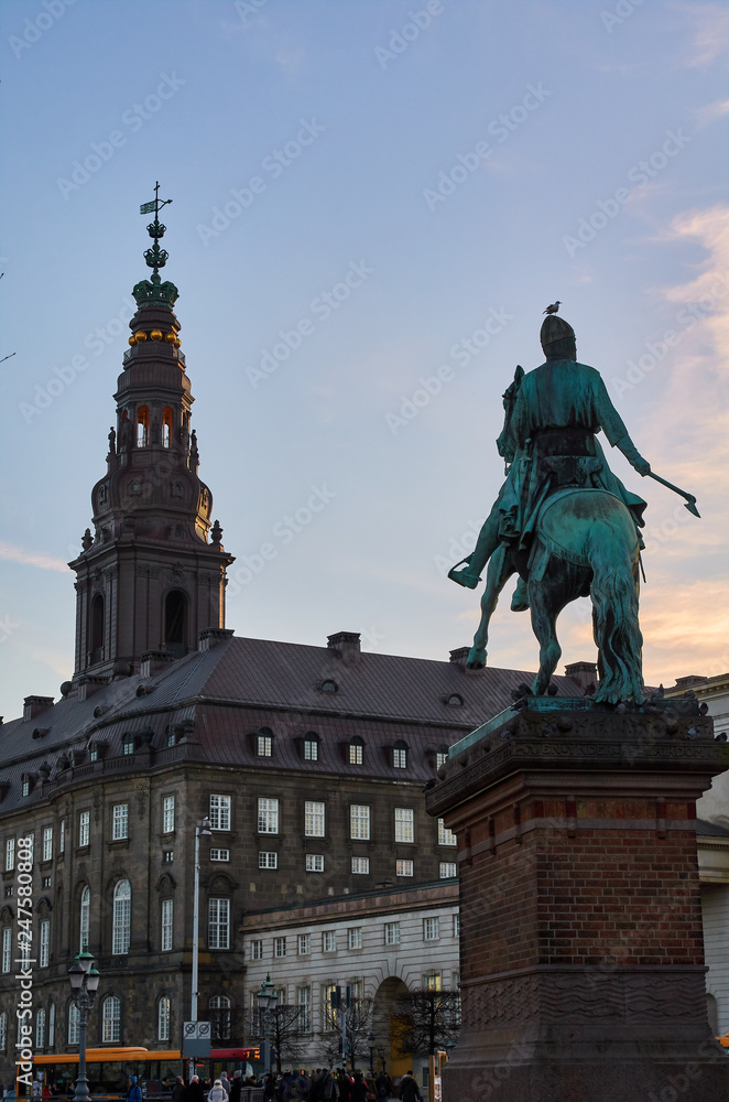 Copenhagen, tower of the baroque Christiansborg Palace and Statue of Absalon