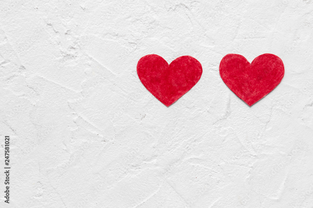 Red paper hearts upright on White background with copy space