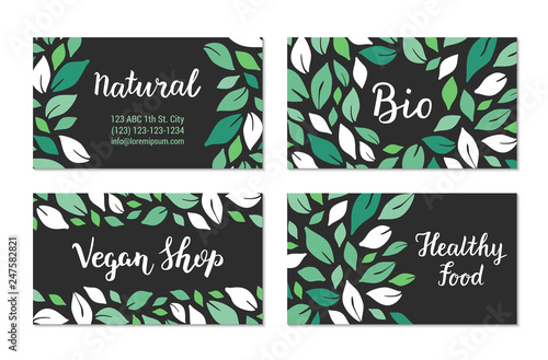 Visit cards with green salad leaves pattern on the black background. Natural, Bio, Vegan shop, Healthy food lettering text. Colourful template design. Plant-based concept. Vector EPS 10 illustration