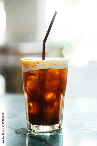 Iced coffee drink with orange slice