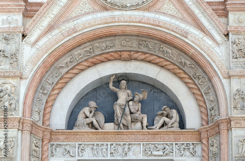 Lunette of the Resurrection  facade of San Petronio Basilica by Alfonso Lombardi in Bologna  Italy