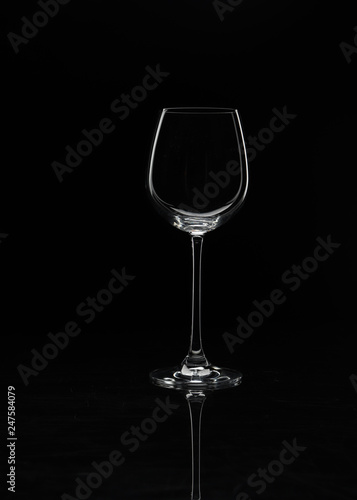 Wine glass on a black background without glare close-up