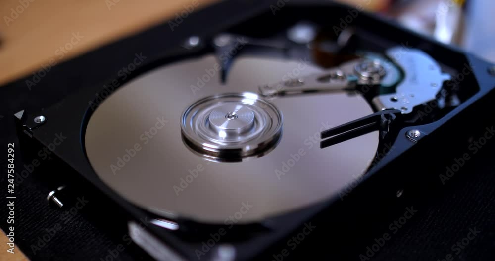 Close ups of an open computer hard drive Close ups of an open computer hard drive