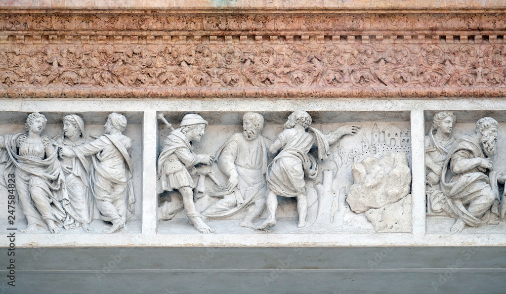 Jesus accompanies the journey of the disciples by Zaccaria da Volterra, door of San Petronio Basilica in Bologna, Italy