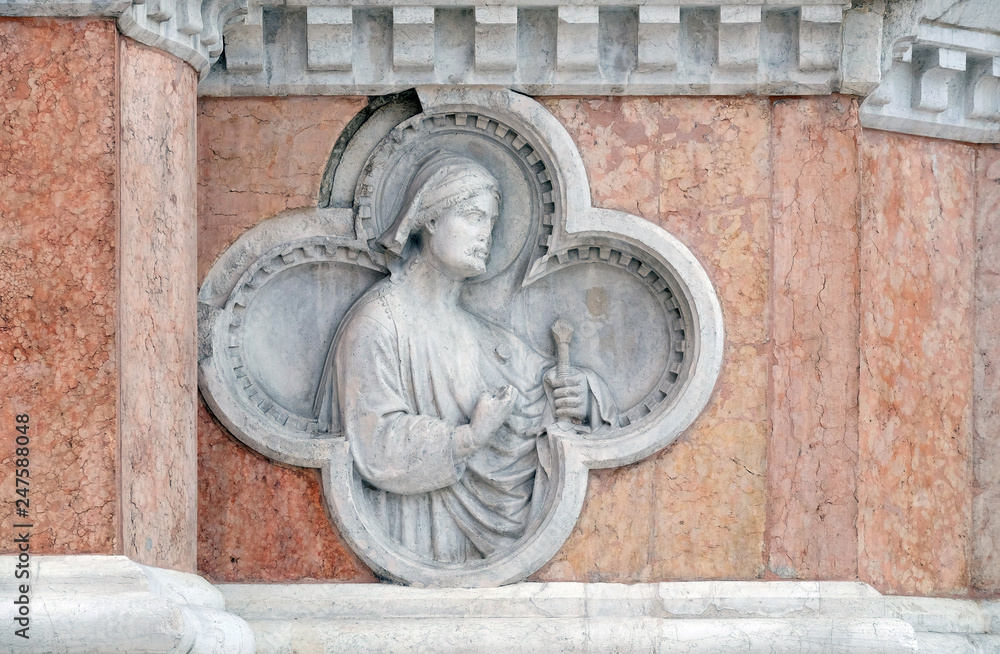Saint Florian by Paolo di Bonaiuto relief on facade of the San Petronio Basilica in Bologna, Italy