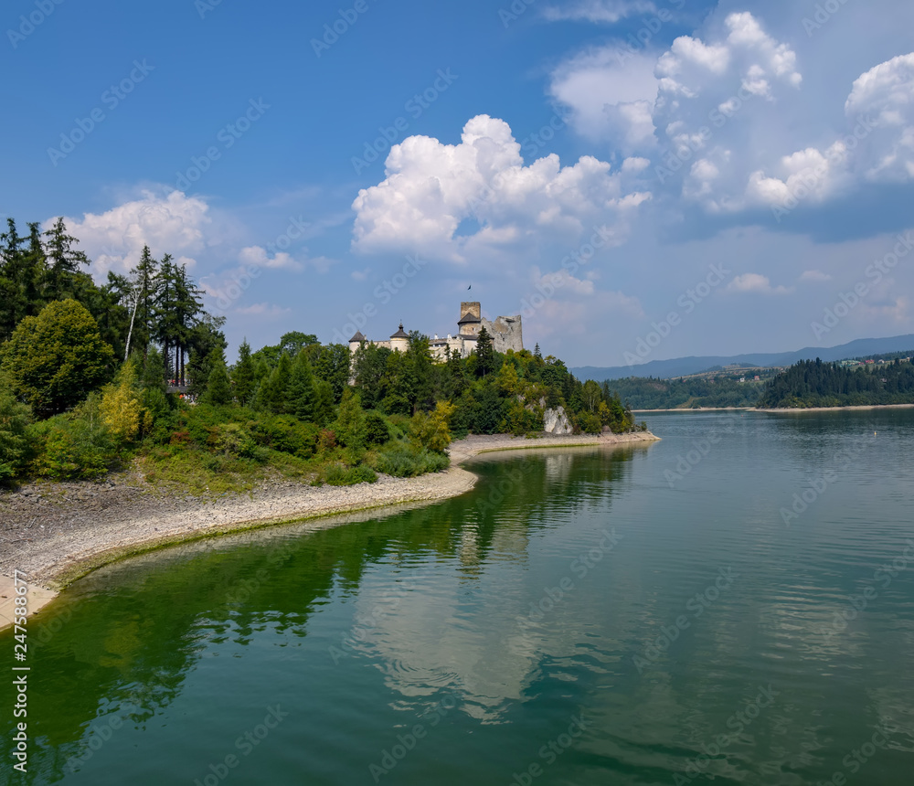 Fototapeta premium Scenic view of Niedzica Castle and artificial Czorsztynskie Lake in Southern Poland