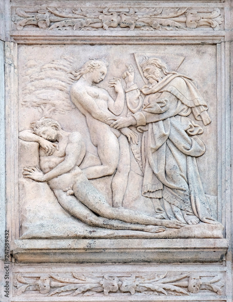 Creation of  Eve, Genesis relief on portal of Saint Petronius Basilica in Bologna, Italy