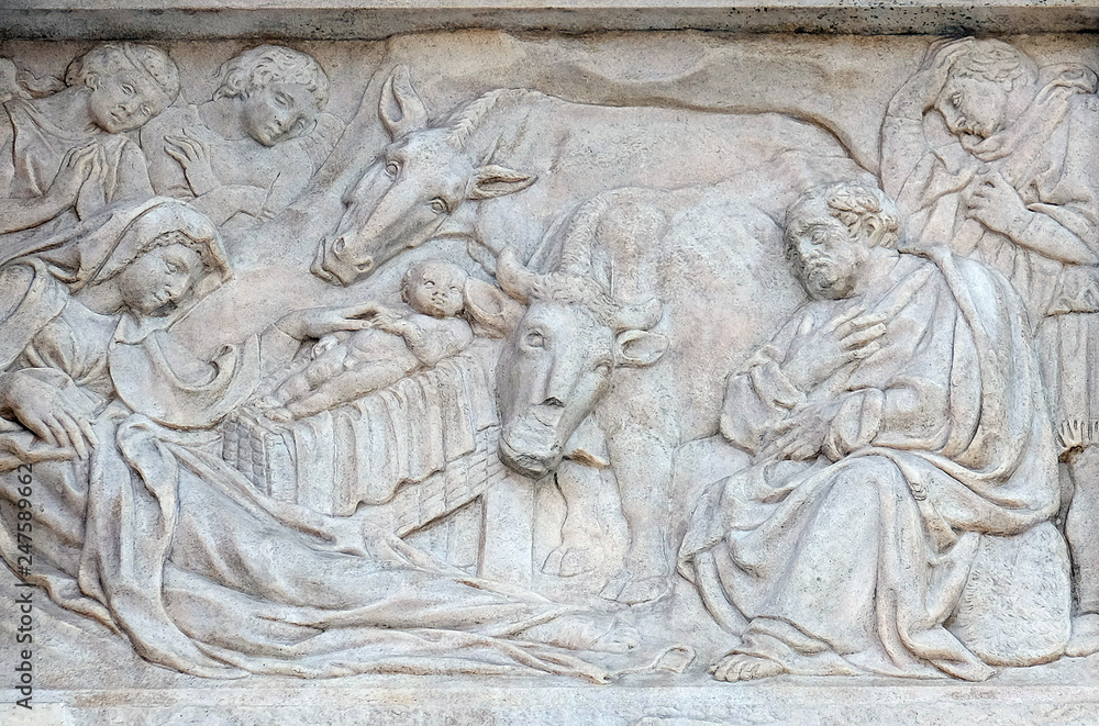 Nativity Scene, Adoration of the Shepherds, relief on portal of Saint Petronius Basilica in Bologna, Italy