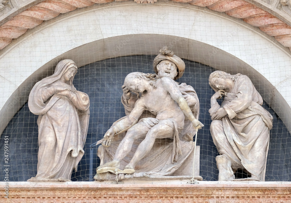 Deposition from the Cross, Virgin Mary and St. John, Lunette of San Petronio Basilica by Ercole Seccadenari in Bologna, Italy