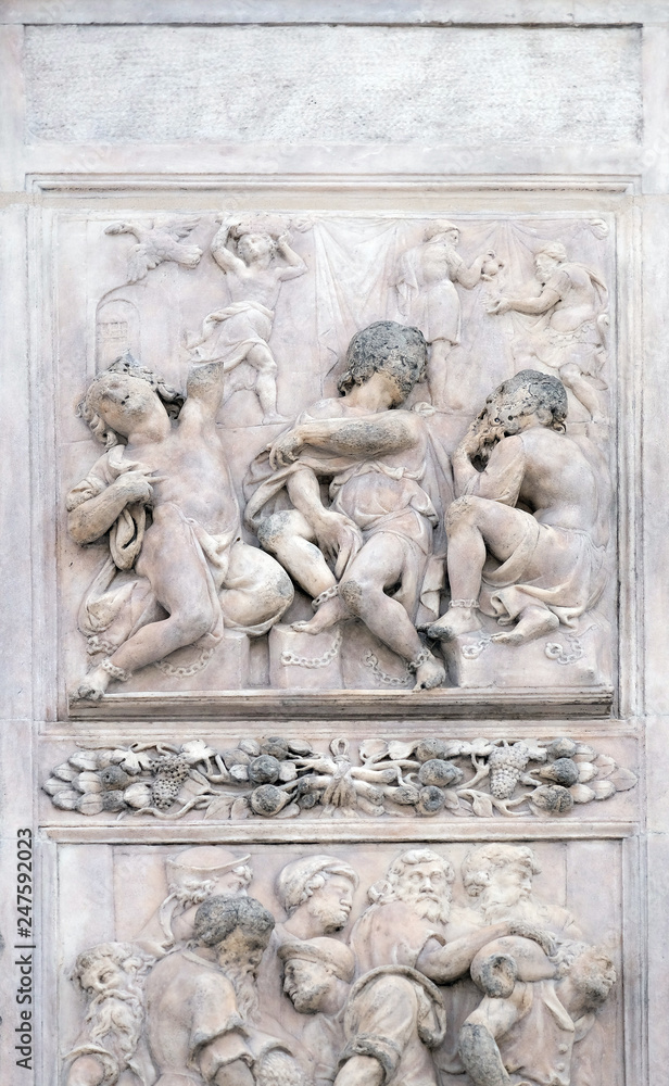 Joseph interprets the dreams by Nicholas Tribolo, right door of San Petronio Basilica in Bologna, Italy