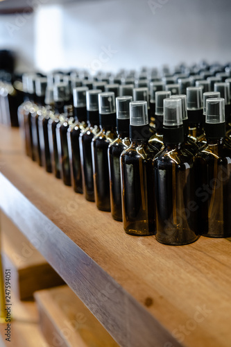 Set of glass dark brown bottles for cosmetics and medicine products