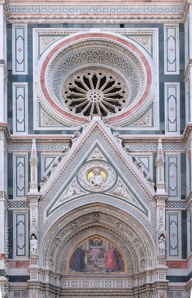 Charity among the founders of Florentine philanthropic institutions, Left Portal of Cattedrale di Santa Maria del Fiore (Cathedral of Saint Mary of the Flower), Florence, Italy 