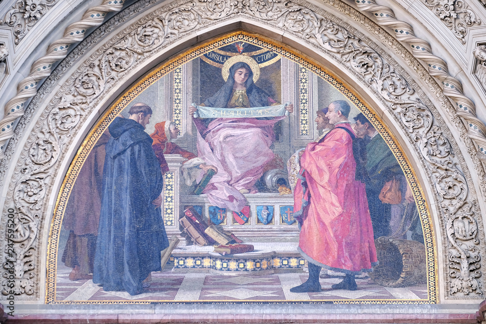 Obraz premium Charity among the founders of Florentine philanthropic institutions, Left Portal of Cattedrale di Santa Maria del Fiore, Florence, Italy 