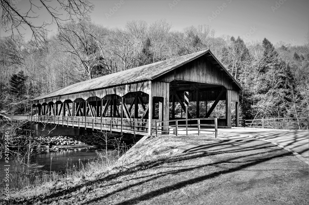 black and white cover bridge in late fall black and white cover bridge in late fall