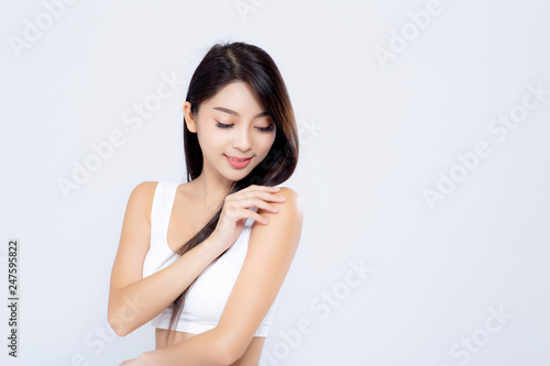 Portrait of beautiful brunette woman makeup of cosmetic, girl hand touch shoulder and smile attractive, face of beauty perfect with wellness isolated on white background with skin healthcare concept.