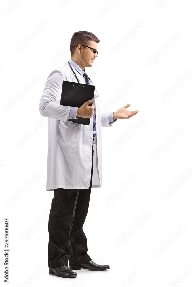 Young male doctor in a lab coat standing and gesturing a conversation Young male doctor in a lab coat standing and gesturing a conversation