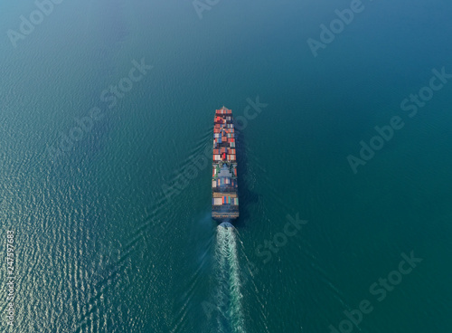 Aerial view container ship at the sea full load container for logistic, import export, shipping or transportation.