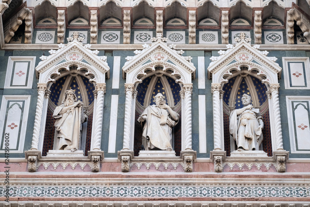 Statues of the Apostles and the fine architectural detail of the of the, Portal of Cattedrale di Santa Maria del Fiore (Cathedral of Saint Mary of the Flower), Florence, Italy