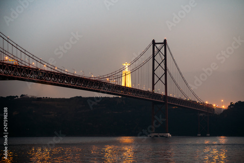 Fototapeta Naklejka Na Ścianę i Meble -  25 april bridge landscape and Christ the King in Lisbon, Portugal