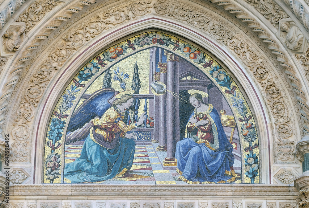 Annunciation by Ghirlandaio brothers, Mandorla Gate, Portal of Cattedrale di Santa Maria del Fiore (Cathedral of Saint Mary of the Flower), Florence, Italy 