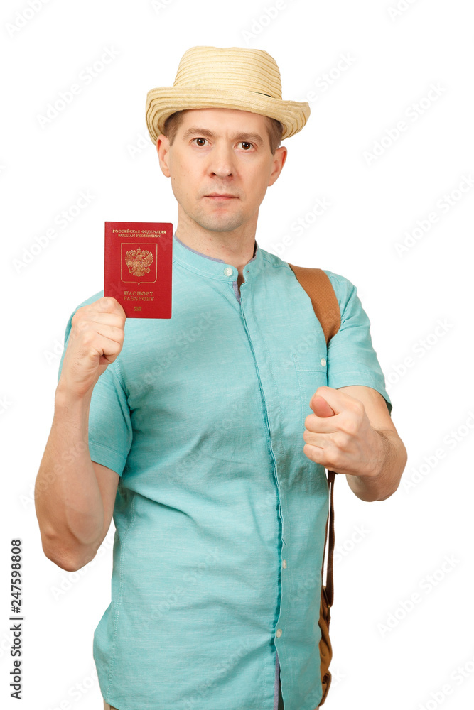 The man with the international passport, in a summer shirt, a hat and a traveling bag. Cocks a fig, a snook, gesture - not to turn out, will not leave The man with the international passport, in a summer shirt, a hat and a traveling bag. Cocks a fig, a snook, gesture - not to turn out, will not leave