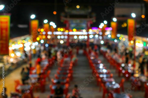 blurred colorful light image of china town restuarest and local market