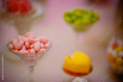 Pink meringue cookies. Candy bar. Table with sweets, candies, dessert