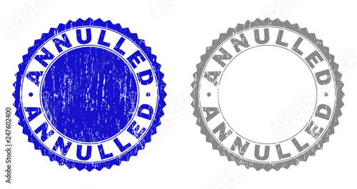 Grunge ANNULLED stamp seals isolated on a white background. Rosette seals with distress texture in blue and grey colors. Vector rubber imitation of ANNULLED text inside round rosette.