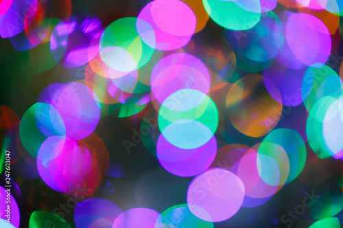 Bright Abstract Blurred colored on black Background Holiday Bokeh . Christmas wallpaper decorations concept