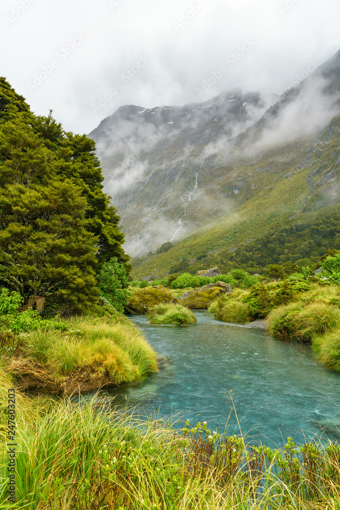 river in the mountains in the rain, getrude valley, new zealand 9