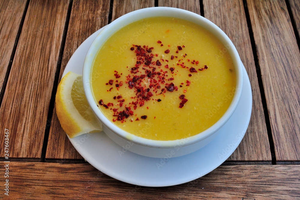 Turkish lentil soup topped with dried chili pepper flakes Turkish lentil soup topped with dried chili pepper flakes
