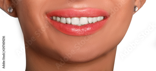 smile of young woman with white teeth and pantonelipstick 