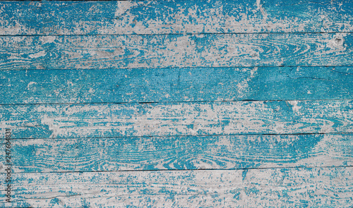 background of wooden boards with blue paint © Lifefoto