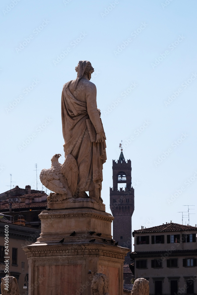 Fototapeta premium Dante Alighieri statue in Santa Croce square in Florence, Italy