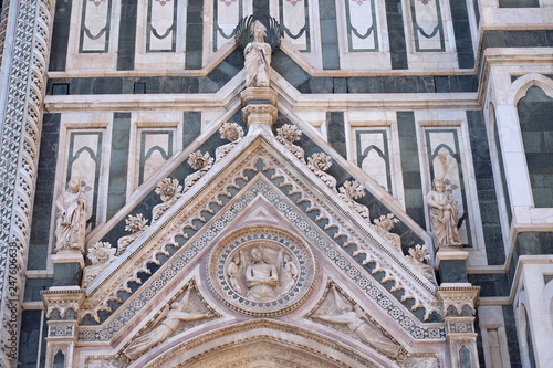 Wrapping Christ in his shroud, Portal of Cattedrale di Santa Maria del Fiore (Cathedral of Saint Mary of the Flower), Florence, Italy  © zatletic